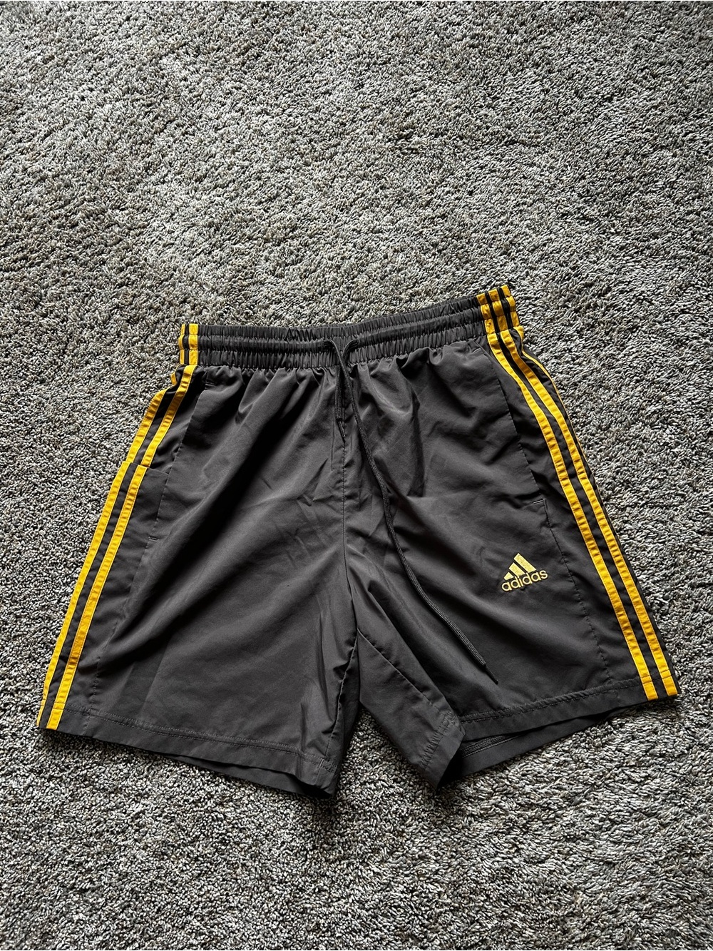 Adidas Men’s Gray Shorts with Yellow Stripes